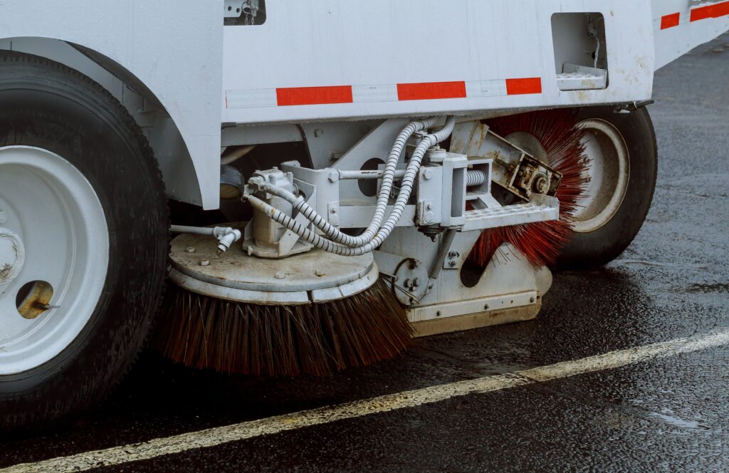 car street sweeper machine cleaning in the road cl 2023 11 27 05 28 43 utc scaled